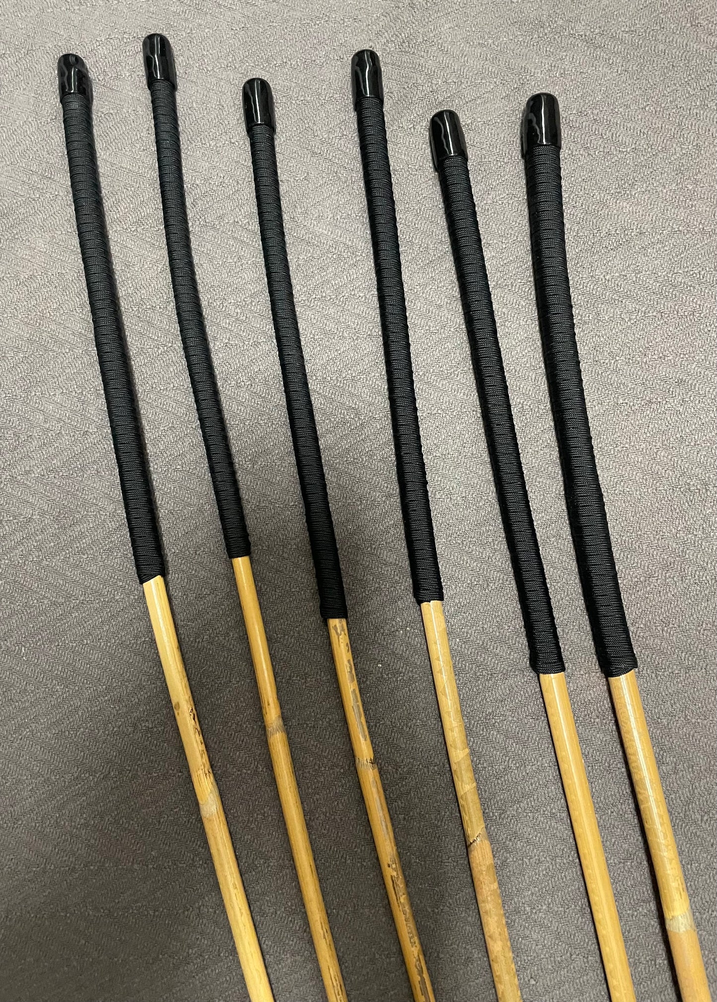 Beginner Kooboo Rattan Punishment canes / BDSM Canes Set of 6 - Black Paracord Handles - Stripewell Canes