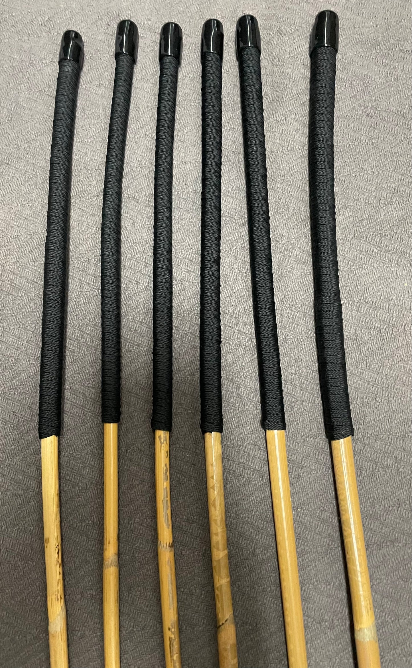 Beginner Kooboo Rattan Punishment canes / BDSM Canes Set of 6 - Black Paracord Handles - Stripewell Canes