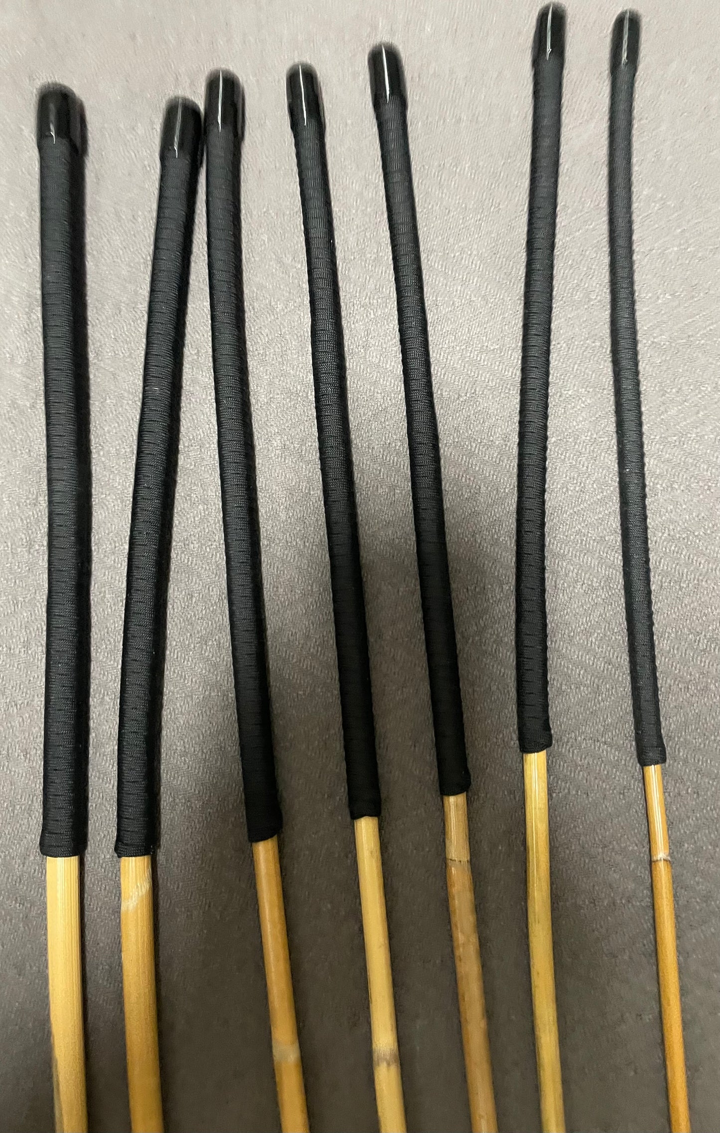 Kooboo Rattan Canes / School Canes Set of 7 Rattan Punishment Canes - 72 - 87 cms Length - Black Paracord Handles - Stripewell Canes