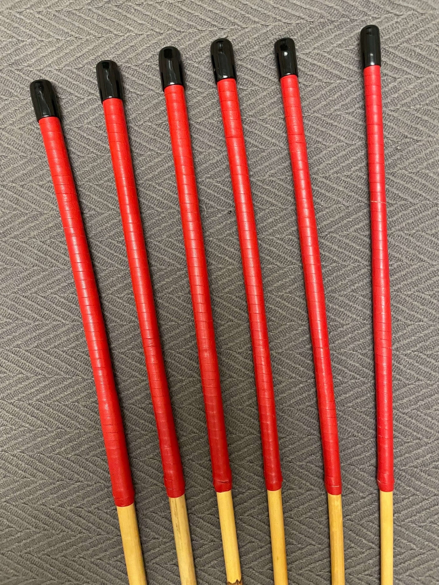 ProDomme Set of 6 Dragon Canes / School Canes / BDSM Canes - 90 cms L & 7.5 - 12.5 mm D - Red Kangaroo Leather Handles - Stripewell Canes