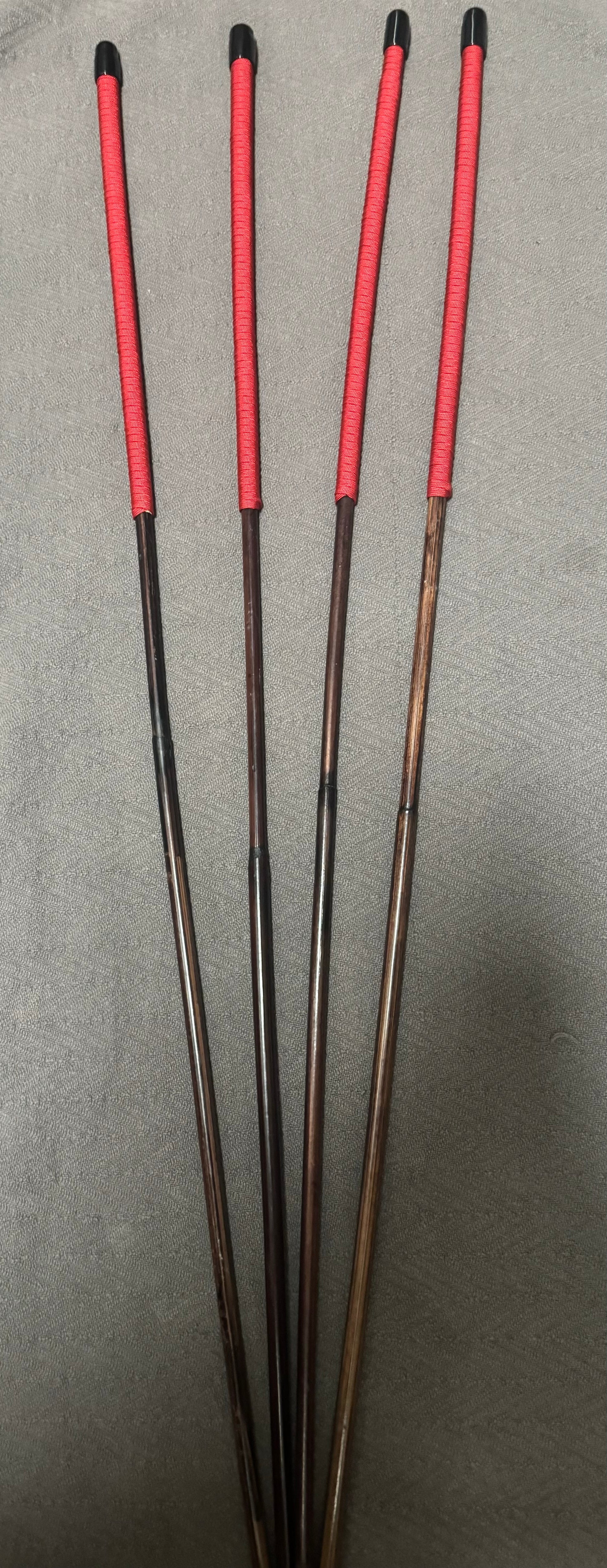 Set of 4 Whippy Smoked Dragon Canes / Falaka Bastinado Canes  - 90 cms L & 8 - 10 mm D - Imperial Red Paracord Handles - Stripewell Canes