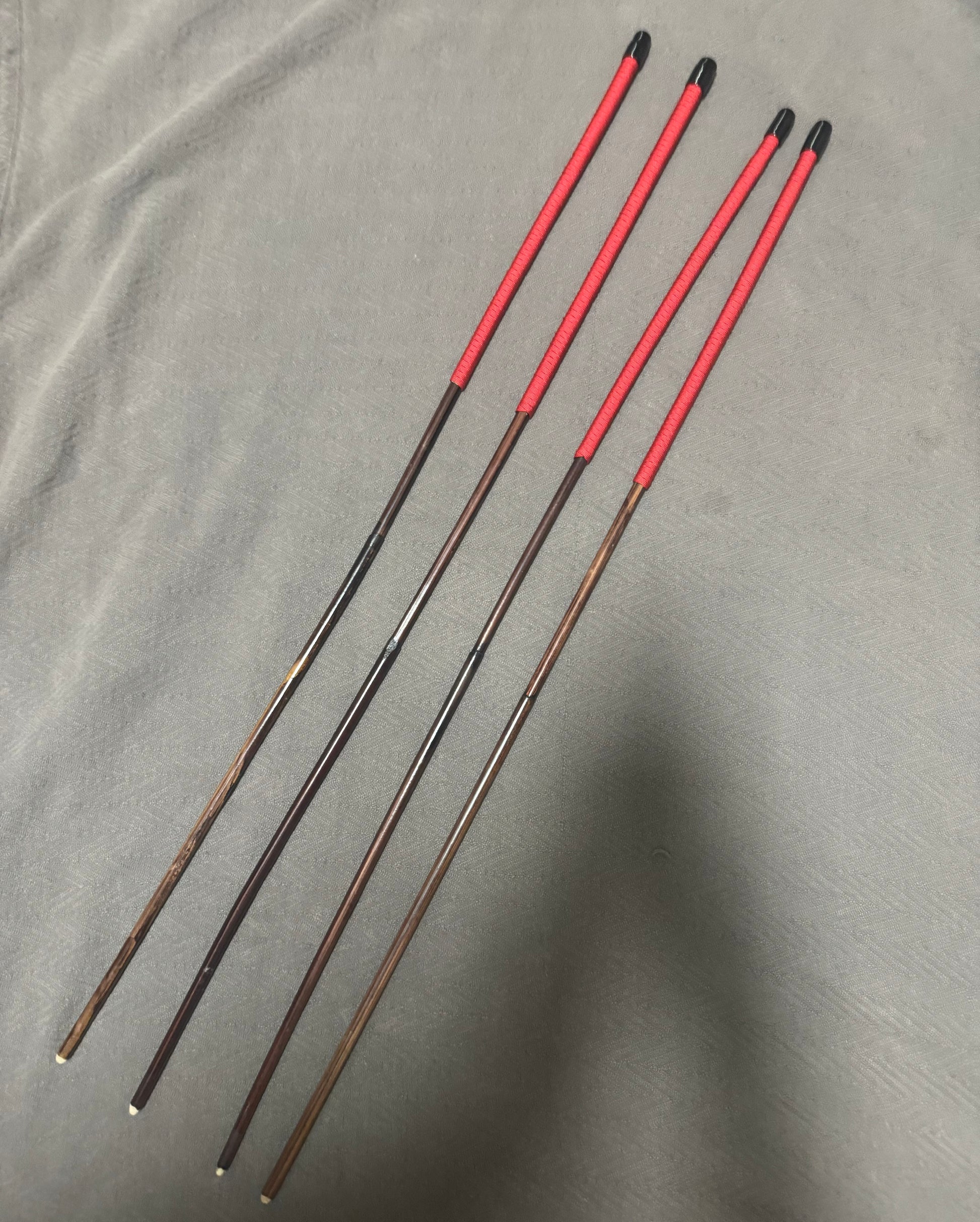 Set of 4 Whippy Smoked Dragon Canes / Falaka Bastinado Canes  - 90 cms L & 8 - 10 mm D - Imperial Red Paracord Handles - Stripewell Canes