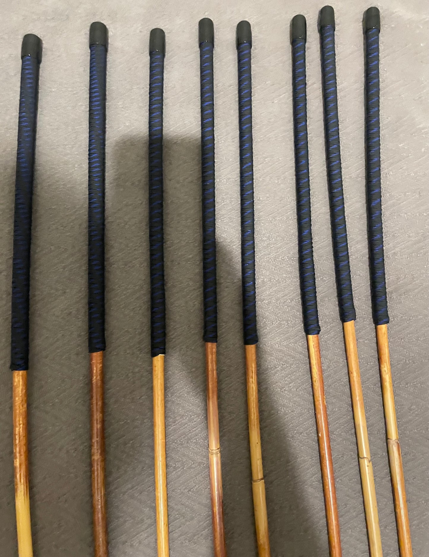 Set of 8 Natural Dragon Canes / BDSM Canes / School Canes SECONDS SET - 95 cms L -& 8.5 - 12.5 mm D - Blue Streak Paracord Handles - Stripewell Canes