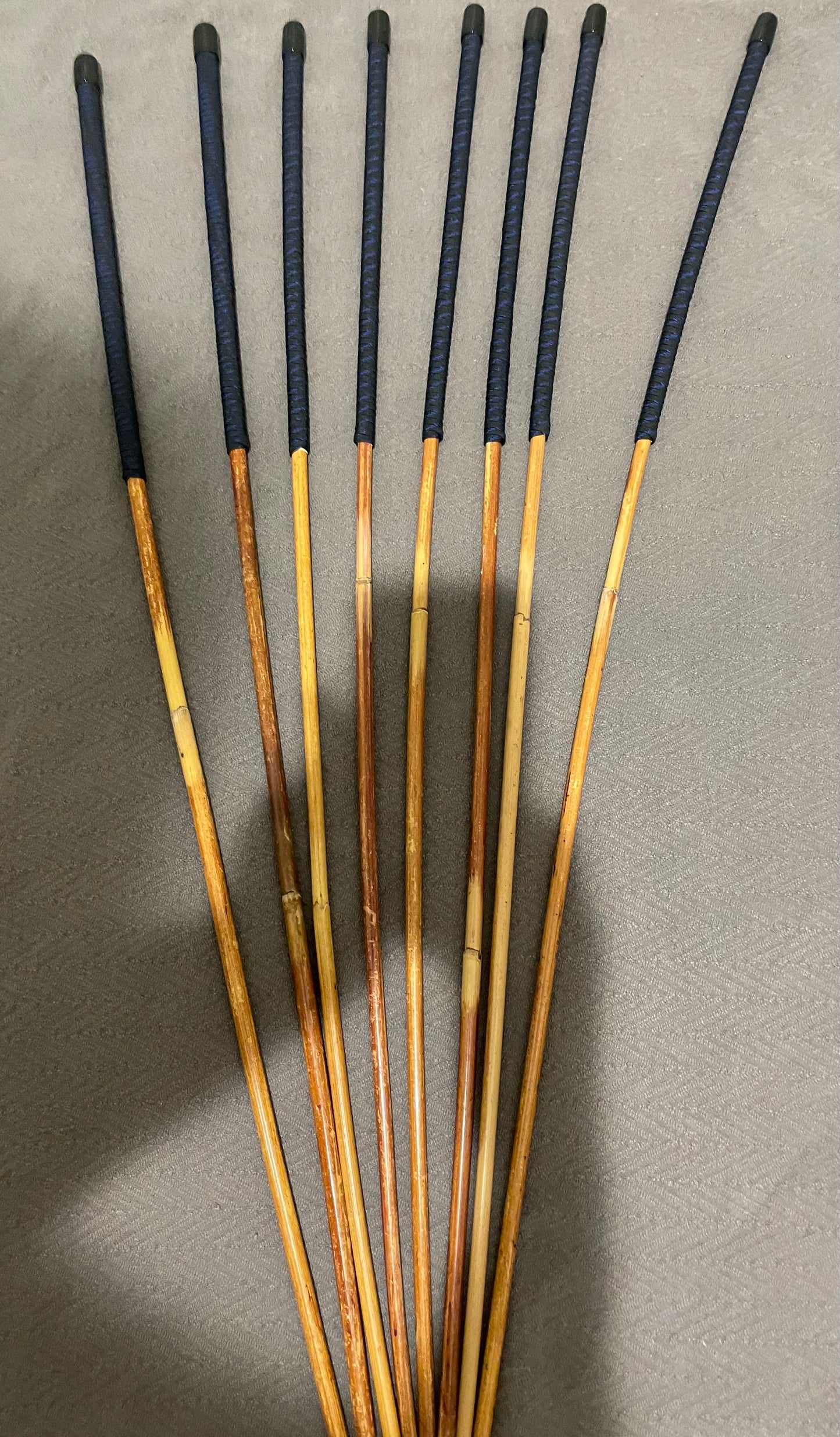 Set of 8 Natural Dragon Canes / BDSM Canes / School Canes SECONDS SET - 95 cms L -& 8.5 - 12.5 mm D - Blue Streak Paracord Handles - Stripewell Canes