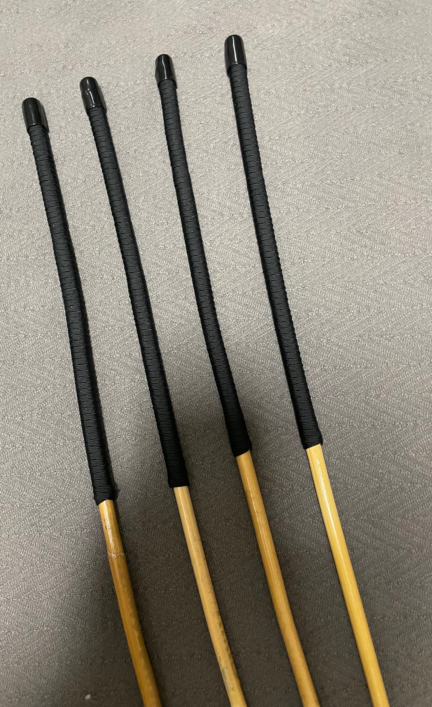 Senior Kooboo Rattan Punishment Canes / School Canes  Set of 4  - 83 - 87 cms L & 9.5 - 10.5 mm D - BLACK Paracord Handles - Stripewell Canes