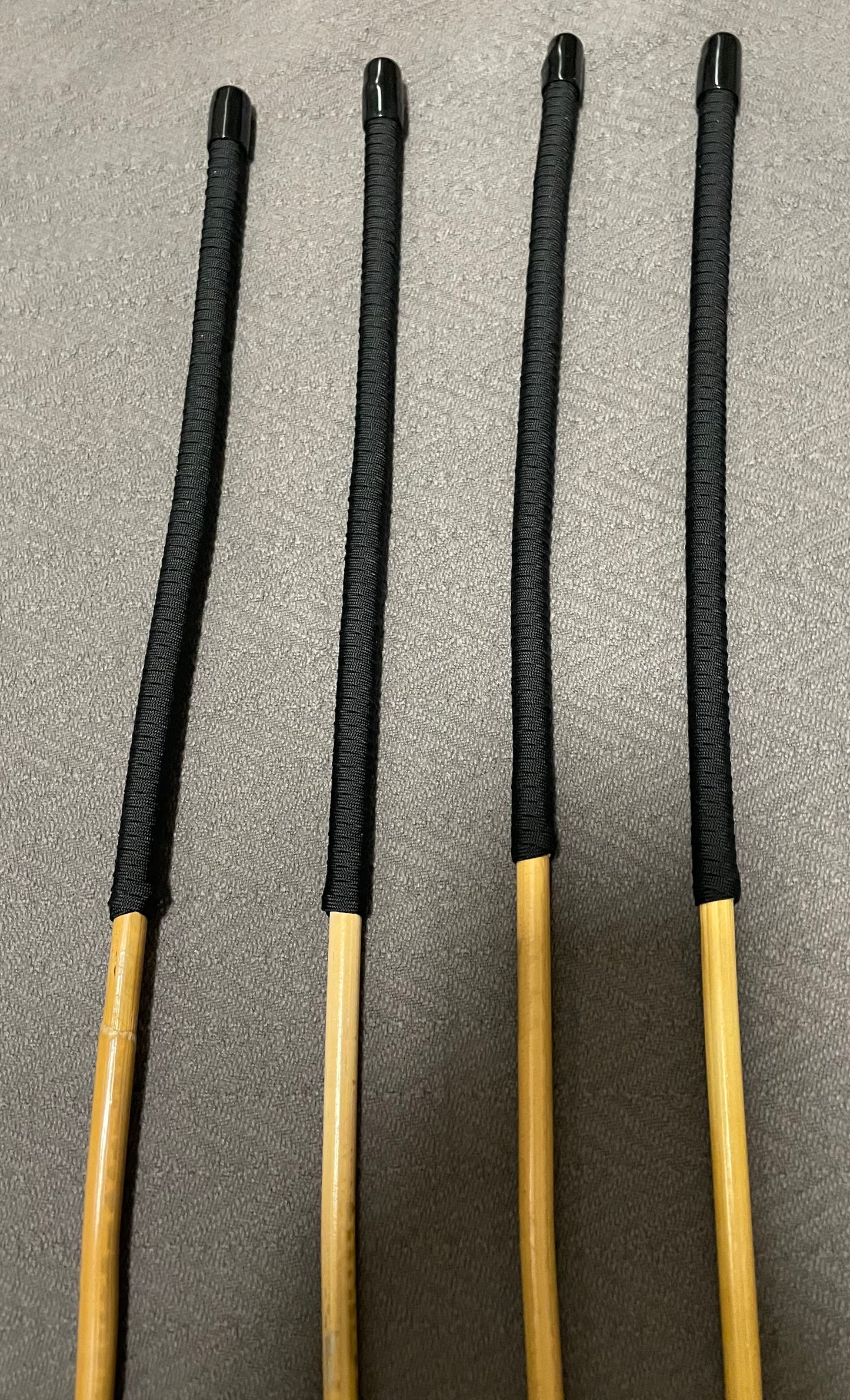 Senior Kooboo Rattan Punishment Canes / School Canes  Set of 4  - 83 - 87 cms L & 9.5 - 10.5 mm D - BLACK Paracord Handles - Stripewell Canes