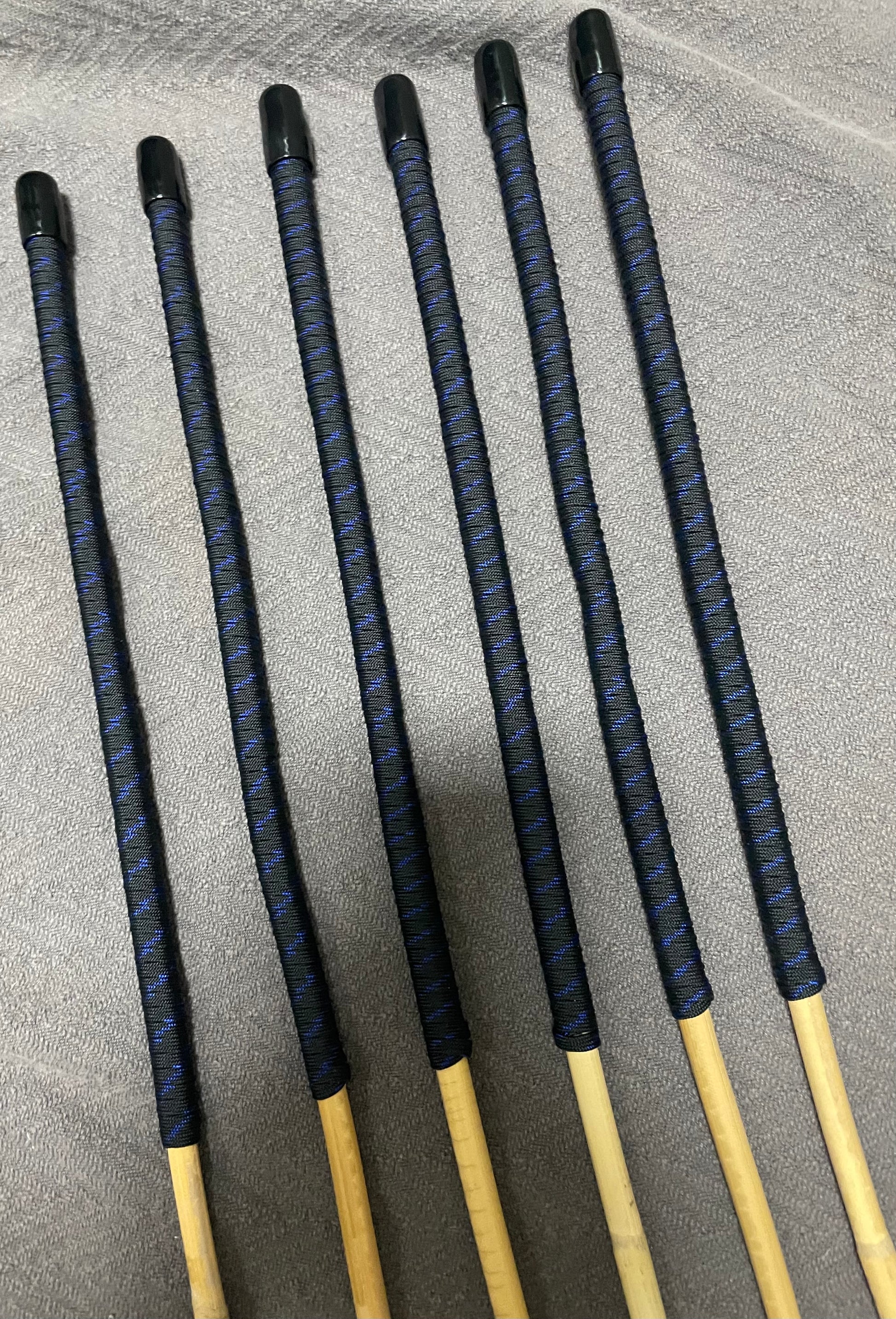 Set of 6 Kooboo Rattan Punishment canes BLUE STREAK Paracord Handles - Stripewell Canes