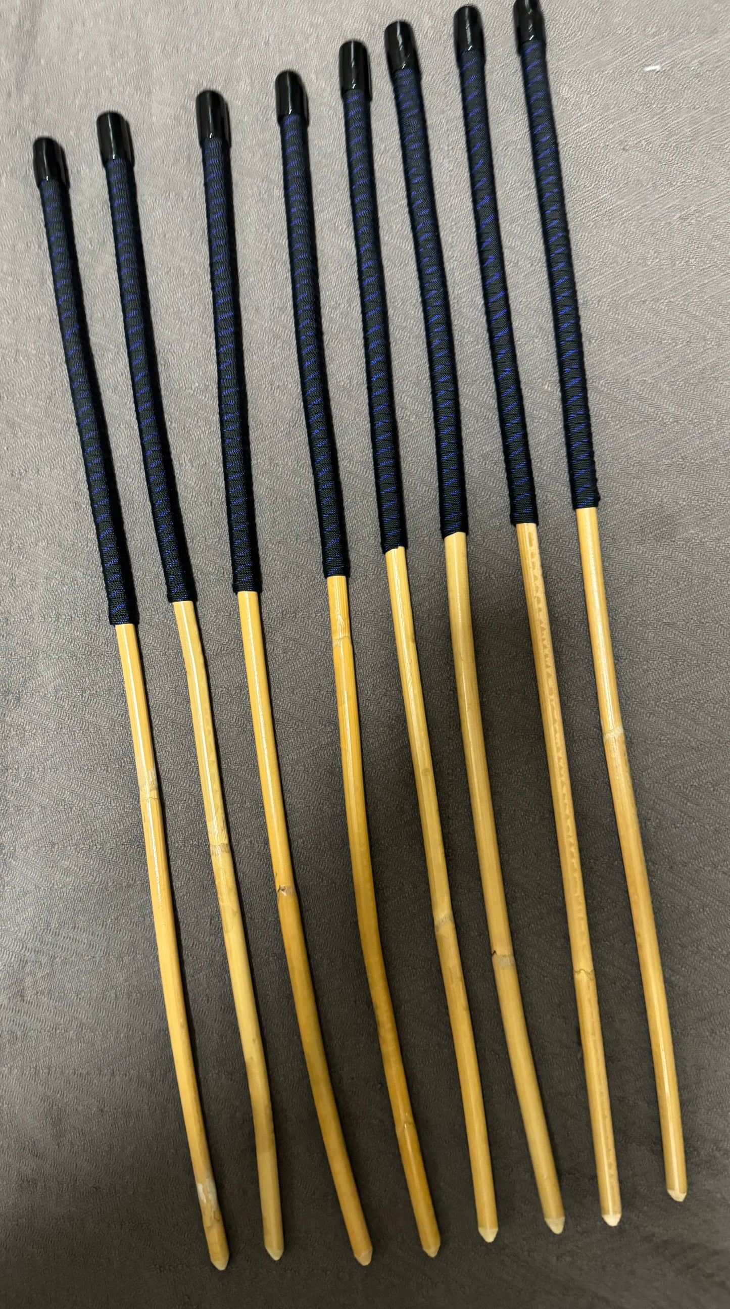 OTK Canes Set of 8 Kooboo Rattan Punishment canes / School Canes - 60 cms Length - BLUE STREAK Paracord Handles - Stripewell Canes