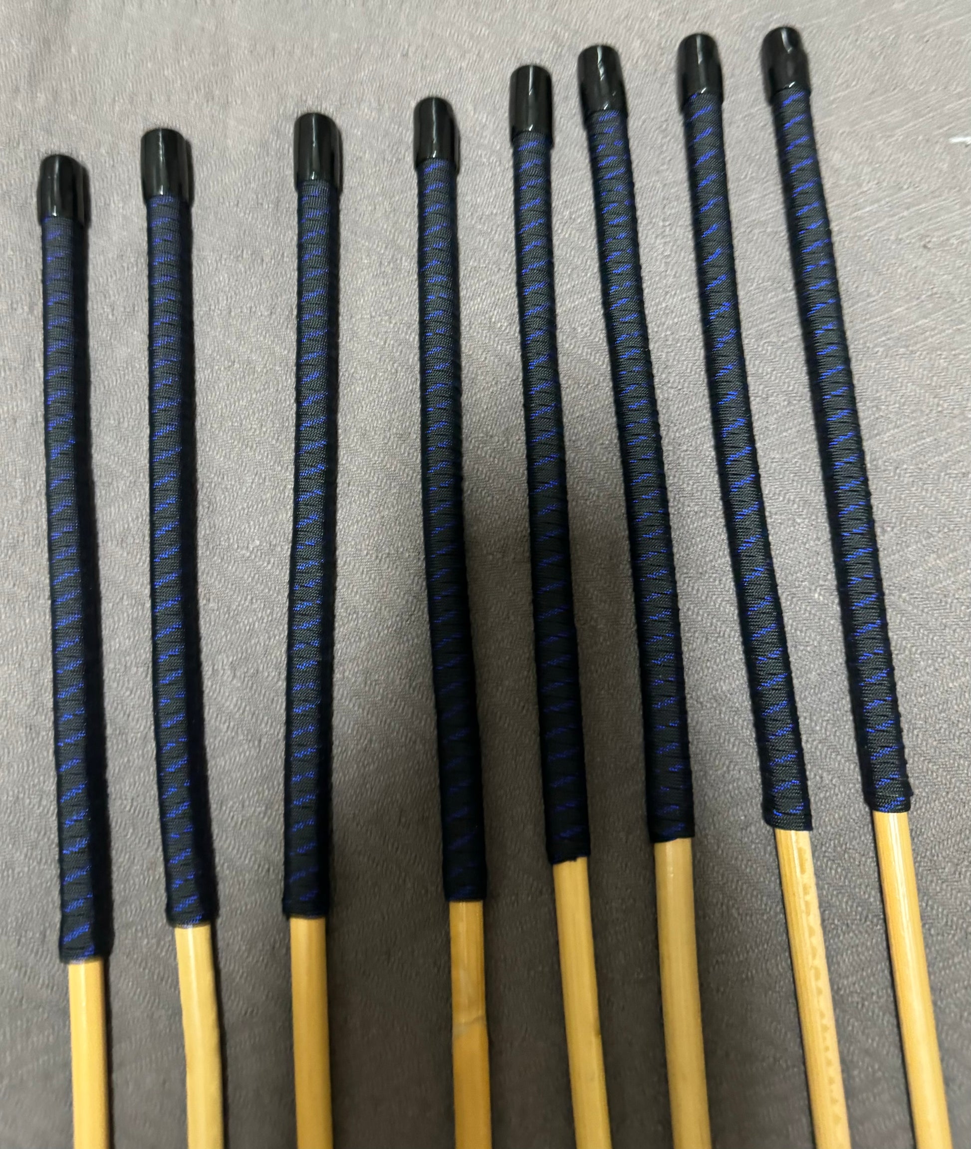 OTK Canes Set of 8 Kooboo Rattan Punishment canes / School Canes - 60 cms Length - BLUE STREAK Paracord Handles - Stripewell Canes