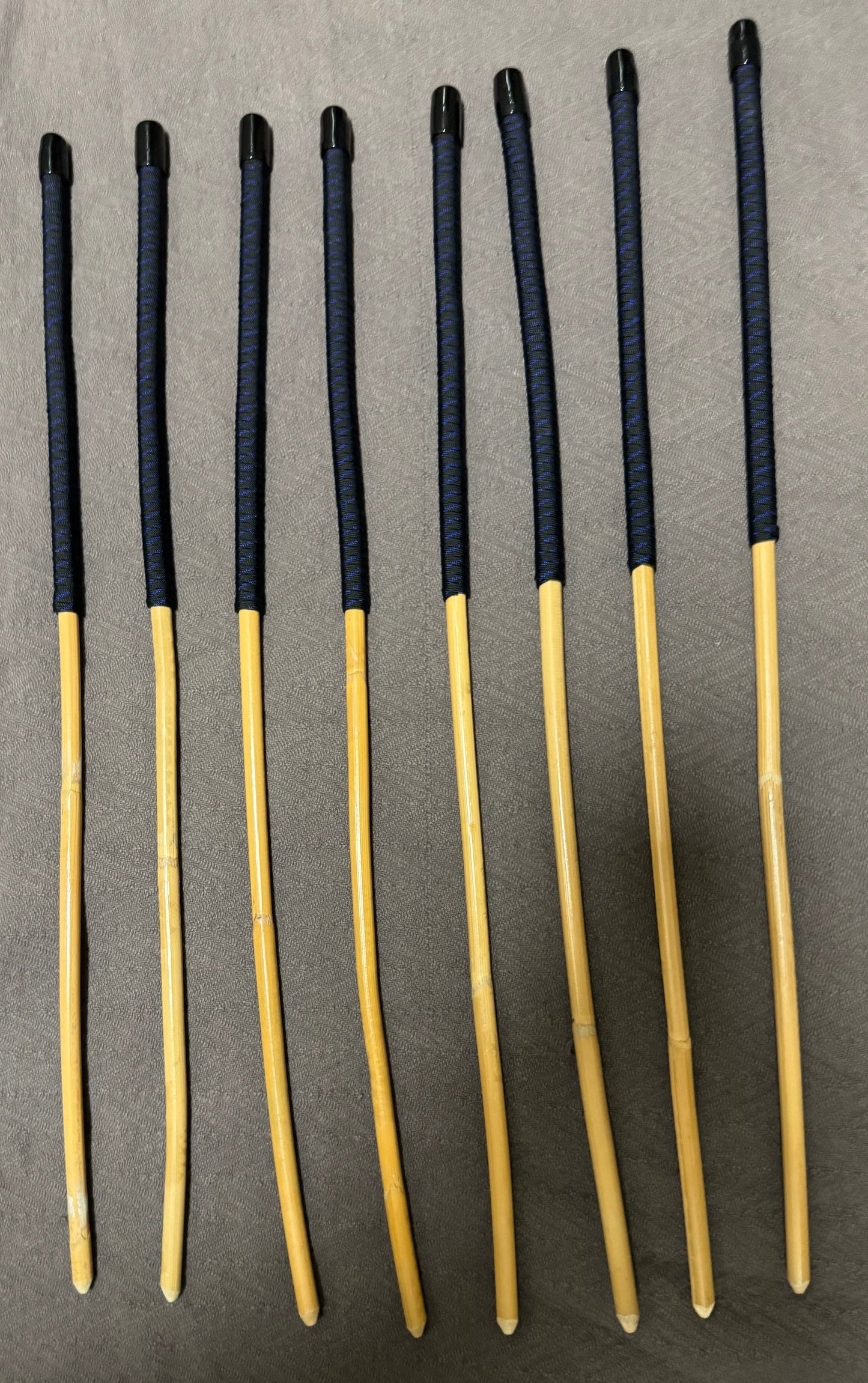 OTK Canes Set of 8 Kooboo Rattan Punishment canes / School Canes - 60 cms Length - BLUE STREAK Paracord Handles - Stripewell Canes