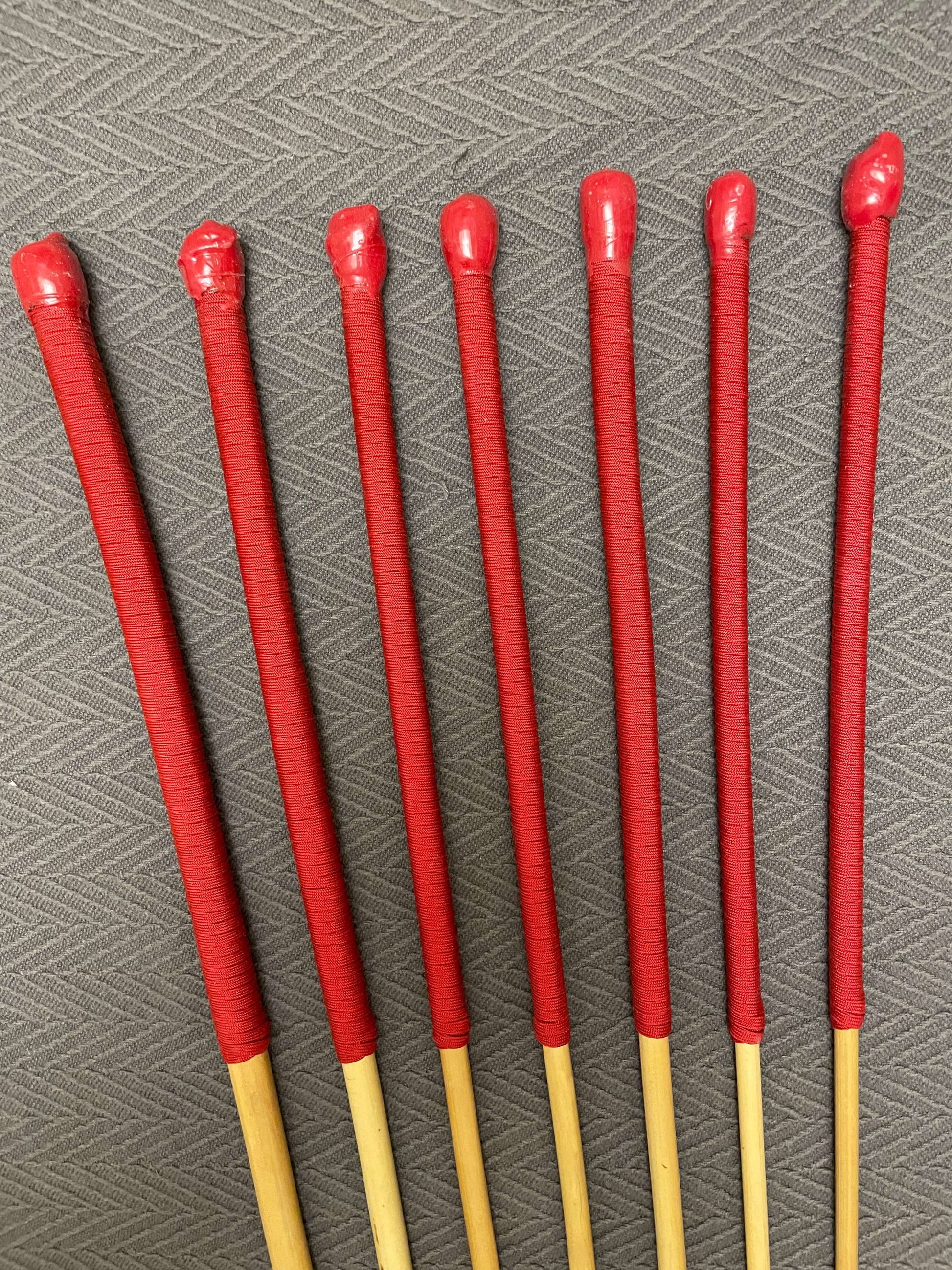 The Six Gate Set of 7 Natural Dragon Canes / BDSM Punishment Canes - 90 cms L & 7.5 - 13.5 mm D - Imperial Red Paracord Handles - Stripewell Canes