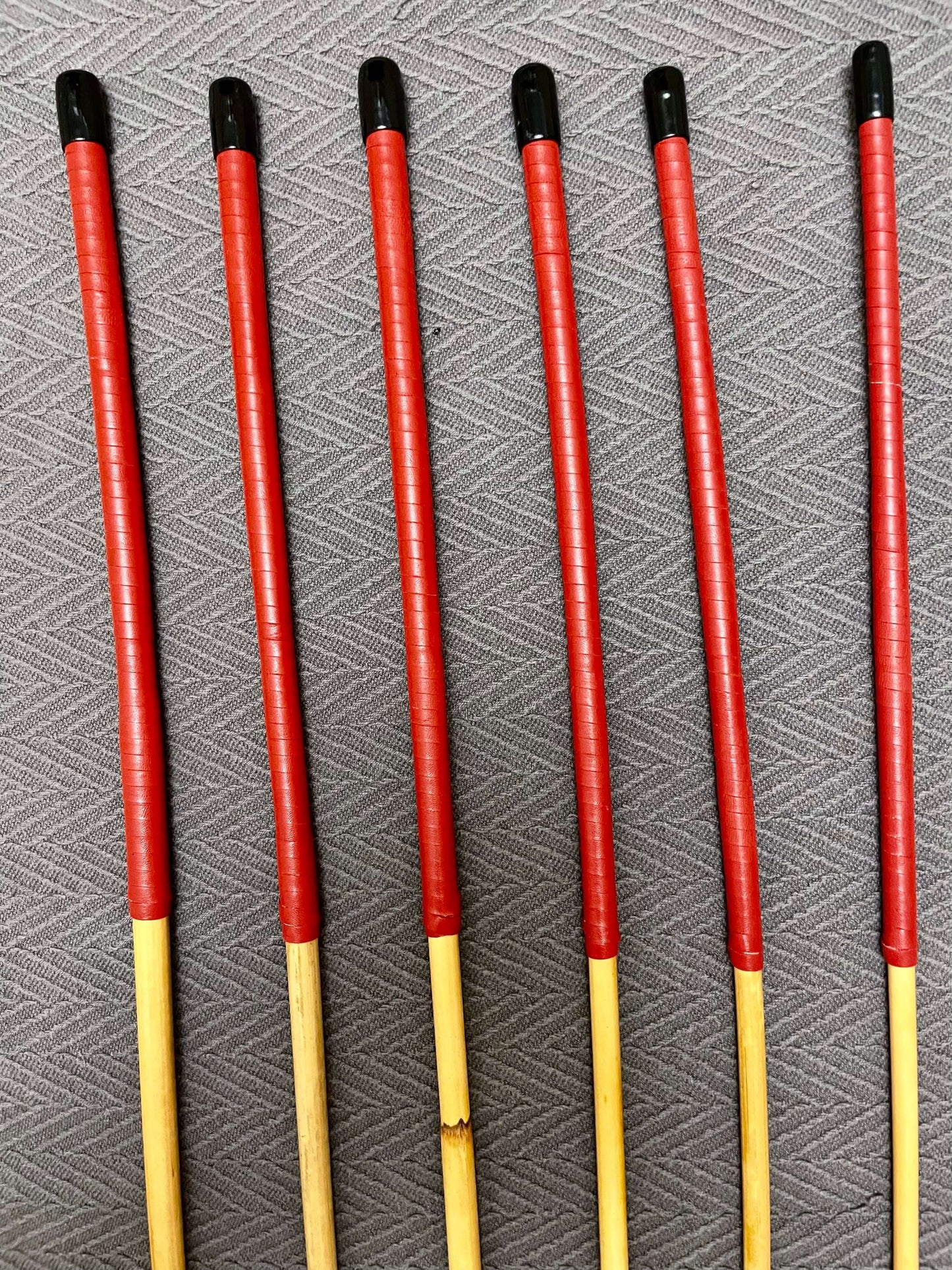 ProDomme Set of 6 Dragon Canes / School Canes / BDSM Canes - 90 cms L & 7.5 - 12.5 mm D - Red Kangaroo Leather Handles - Stripewell Canes