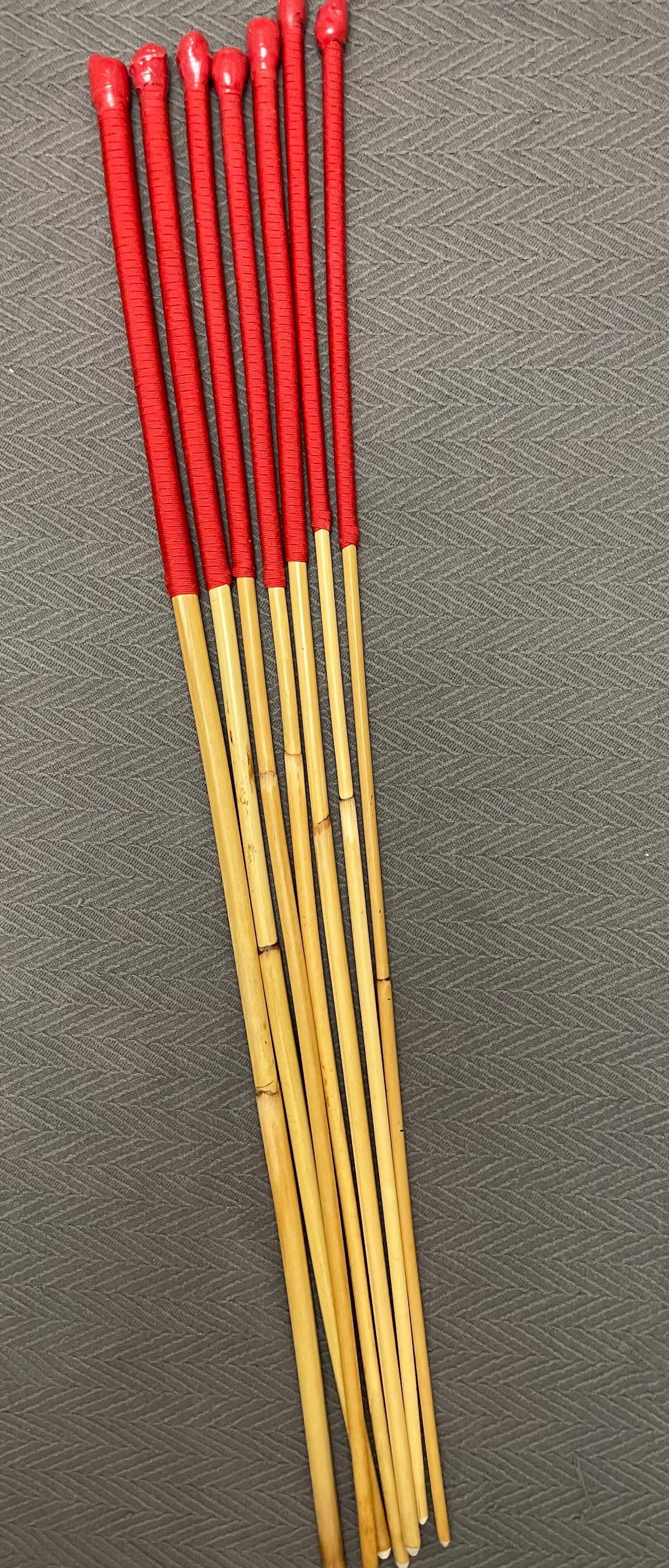 The Six Gate Set of 7 Natural Dragon Canes / BDSM Punishment Canes - 90 cms L & 7.5 - 13.5 mm D - Imperial Red Paracord Handles - Stripewell Canes