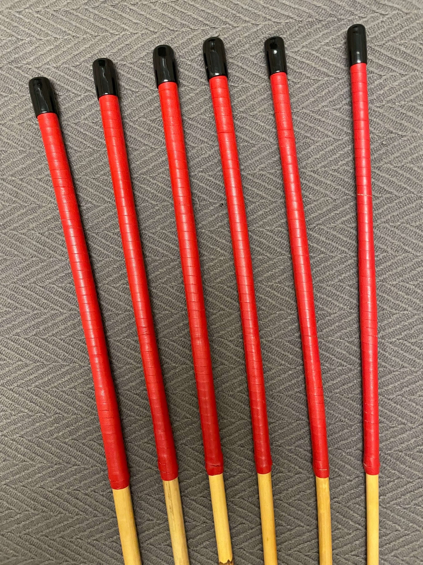 ProDomme Set of 6 Dragon Canes / School Canes / BDSM Canes - 90 cms L & 7.5 - 12.5 mm D - Red Kangaroo Leather Handles - Stripewell Canes