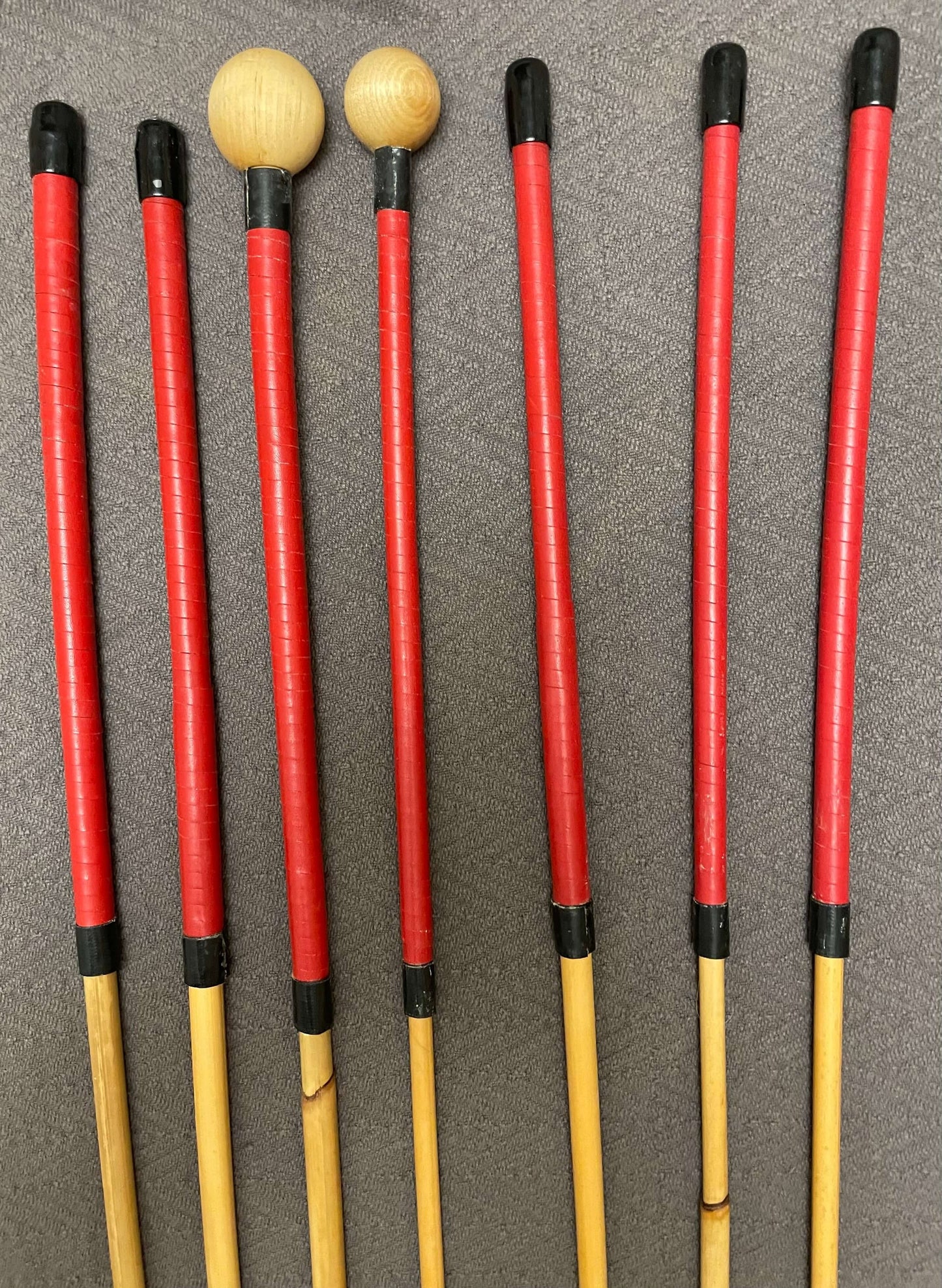 Pro Disciplinarian Dungeon Set of 7 Dragon Canes / BDSM Dominatrix Canes - 95 - 110 cms L - Red Kangaroo Leather Handles - Stripewell Canes