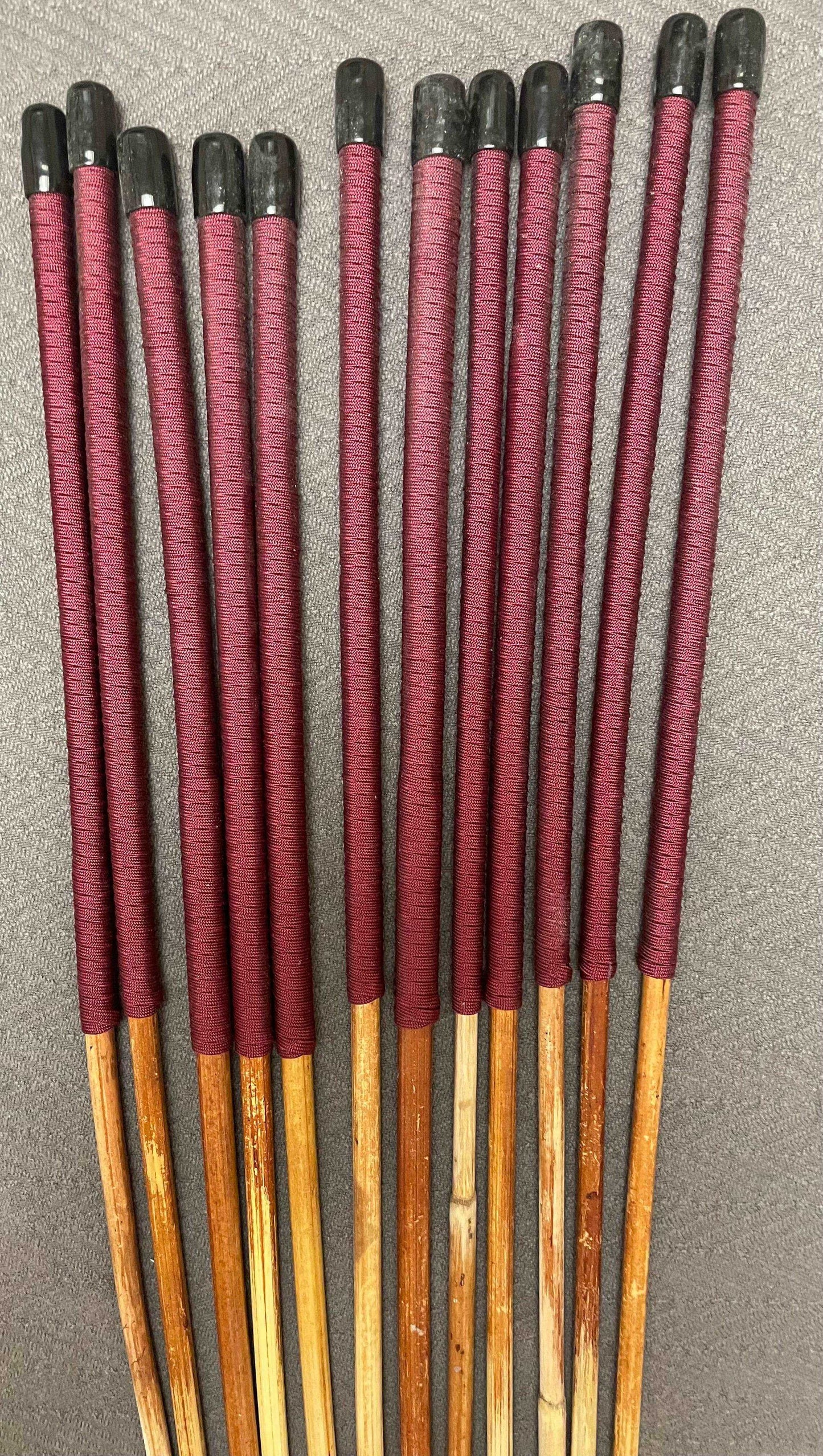 Set of 12 Natural Dragon Rattan Punishment Canes / School Canes / Whipping Canes - SECONDS SET - 95/100 cms Length - BURGUNDY HANDLES - Stripewell Canes