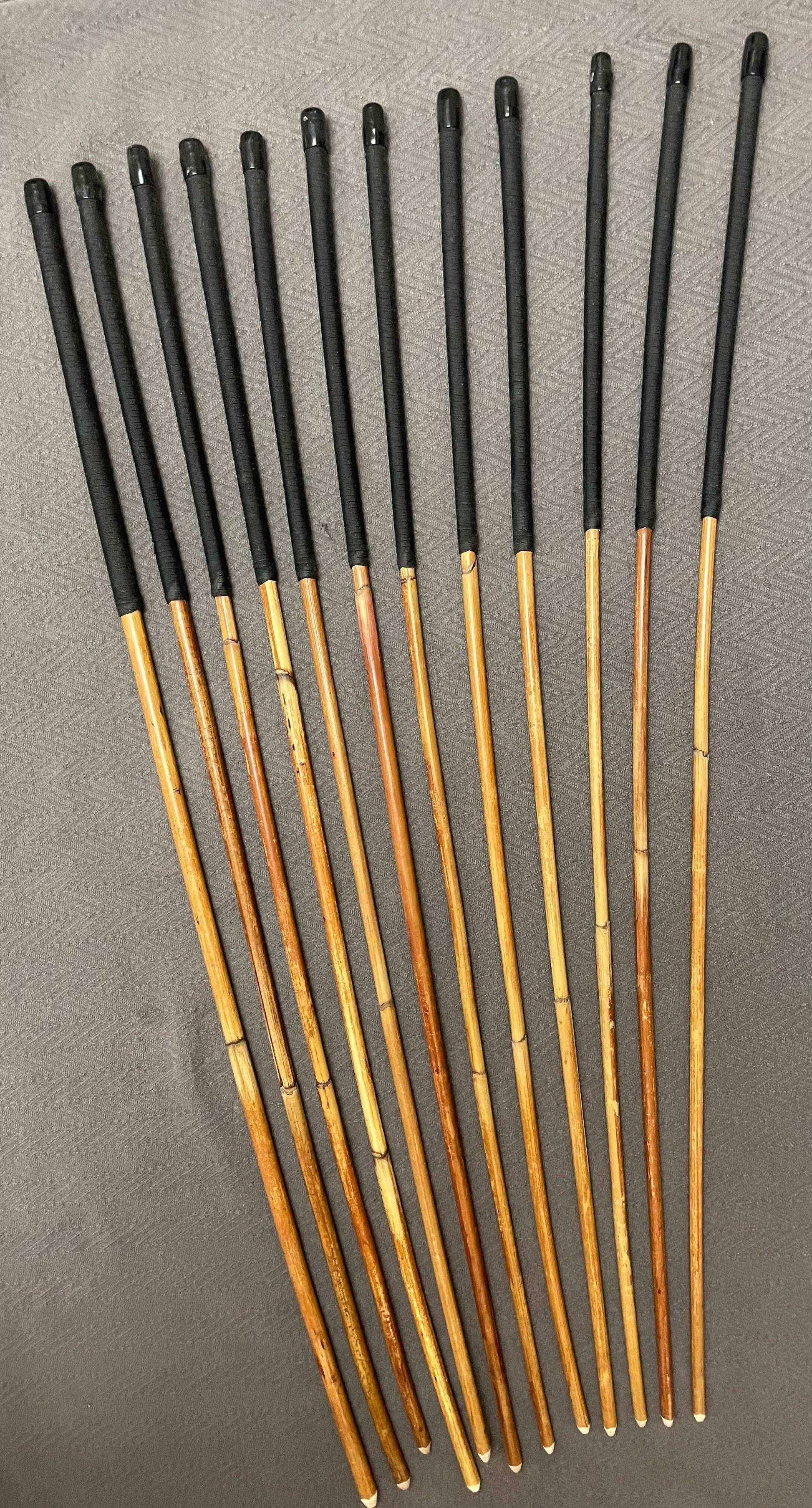 Set of 12 Natural Dragon Rattan Punishment Canes / School Canes / Whipping Canes - SECONDS SET - 95/100 cms Length - BLACK HANDLES - Stripewell Canes