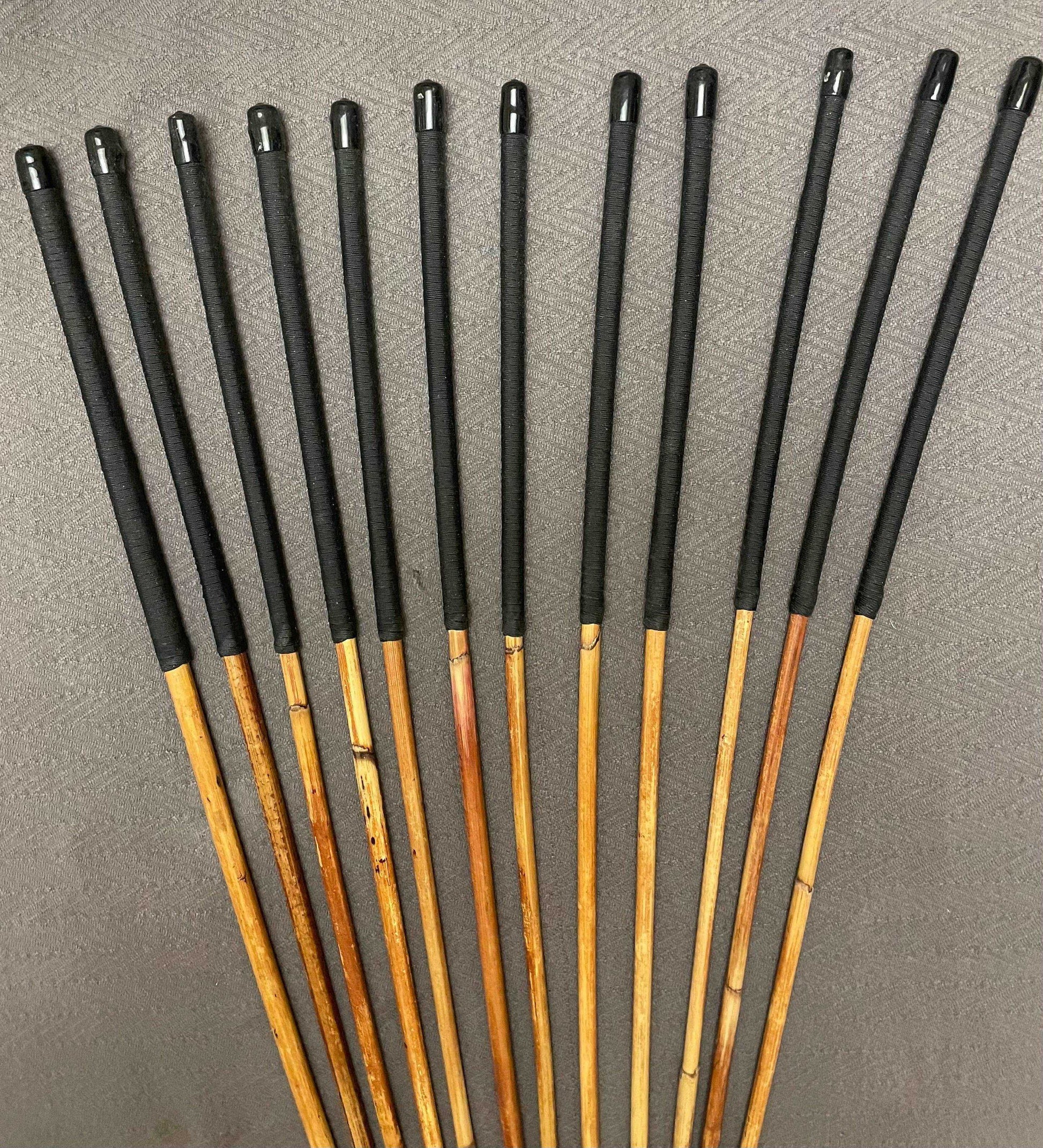 Set of 12 Natural Dragon Rattan Punishment Canes / School Canes / Whipping Canes - SECONDS SET - 95/100 cms Length - BLACK HANDLES - Stripewell Canes