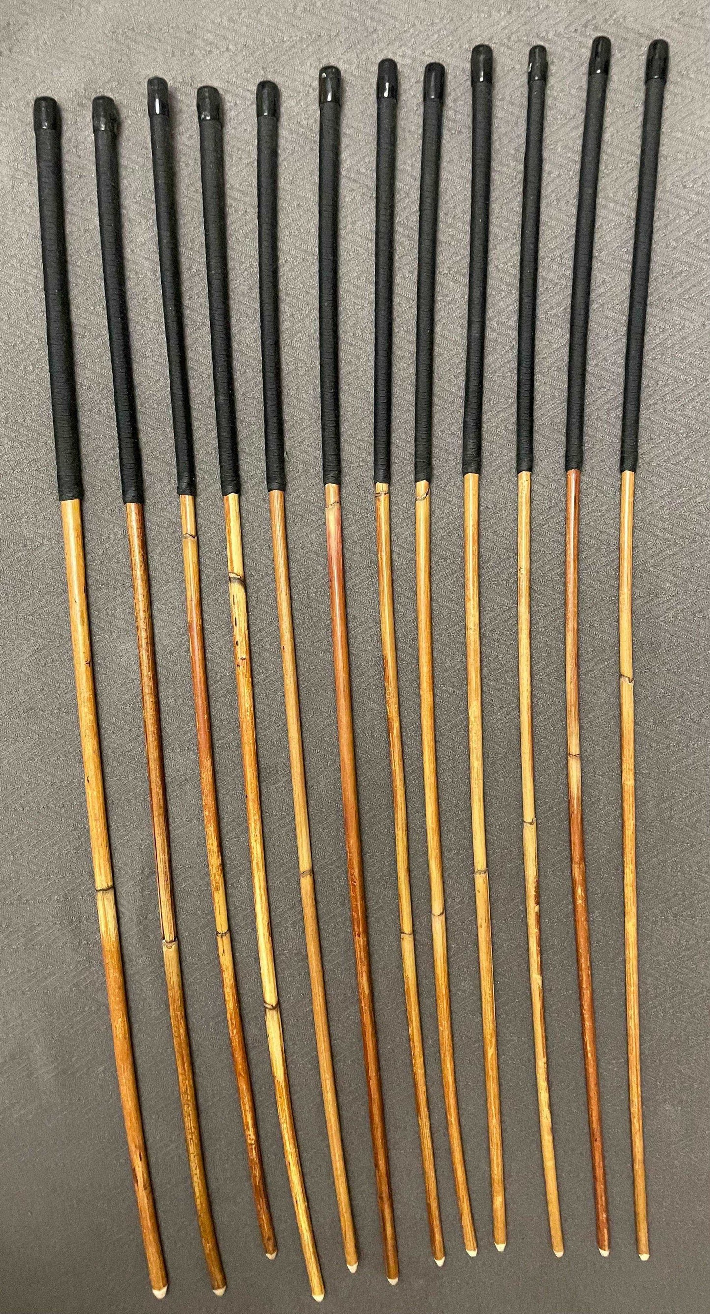 Set of 12 Natural Dragon Rattan Punishment Canes / School Canes / Whipping Canes - SECONDS SET - 95/100 cms Length - BLACK HANDLES - Stripewell Canes