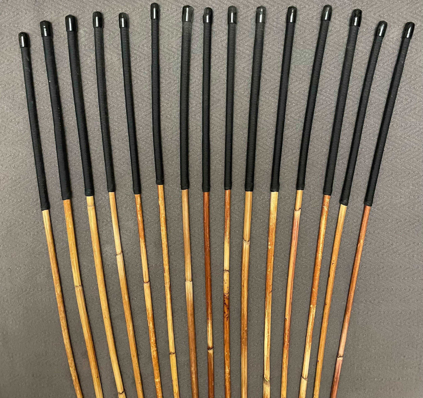 Set of 15 Natural Dragon Rattan Punishment Canes / School Canes / Whipping Canes - SECONDS SET - 95/100 cms Length - BLACK HANDLES - Stripewell Canes