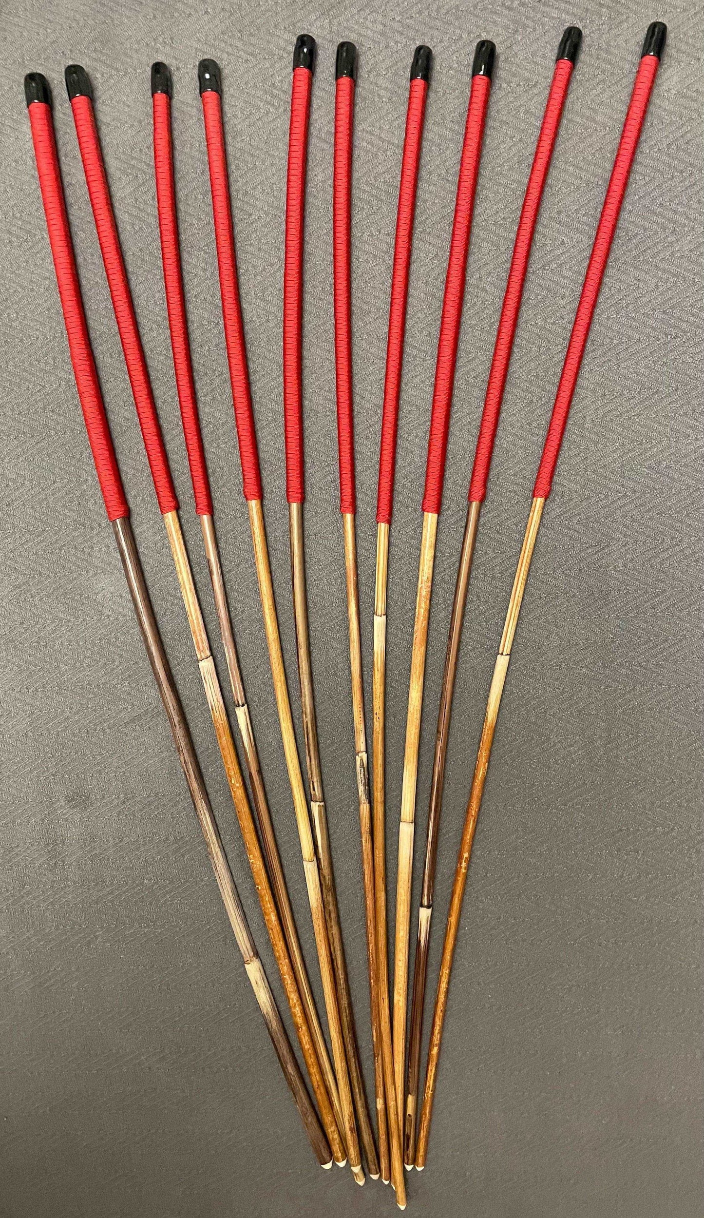 Set of 10 Natural Dragon Rattan Punishment Canes / School Canes / Whipping Canes - SECONDS SET - 95/100 cms Length - RED HANDLES - Stripewell Canes