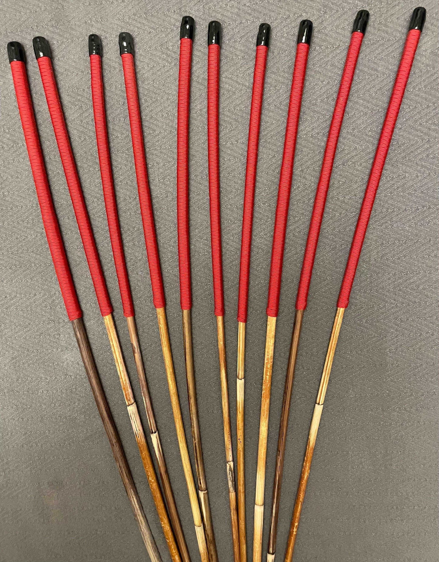 Set of 10 Natural Dragon Rattan Punishment Canes / School Canes / Whipping Canes - SECONDS SET - 95/100 cms Length - RED HANDLES - Stripewell Canes