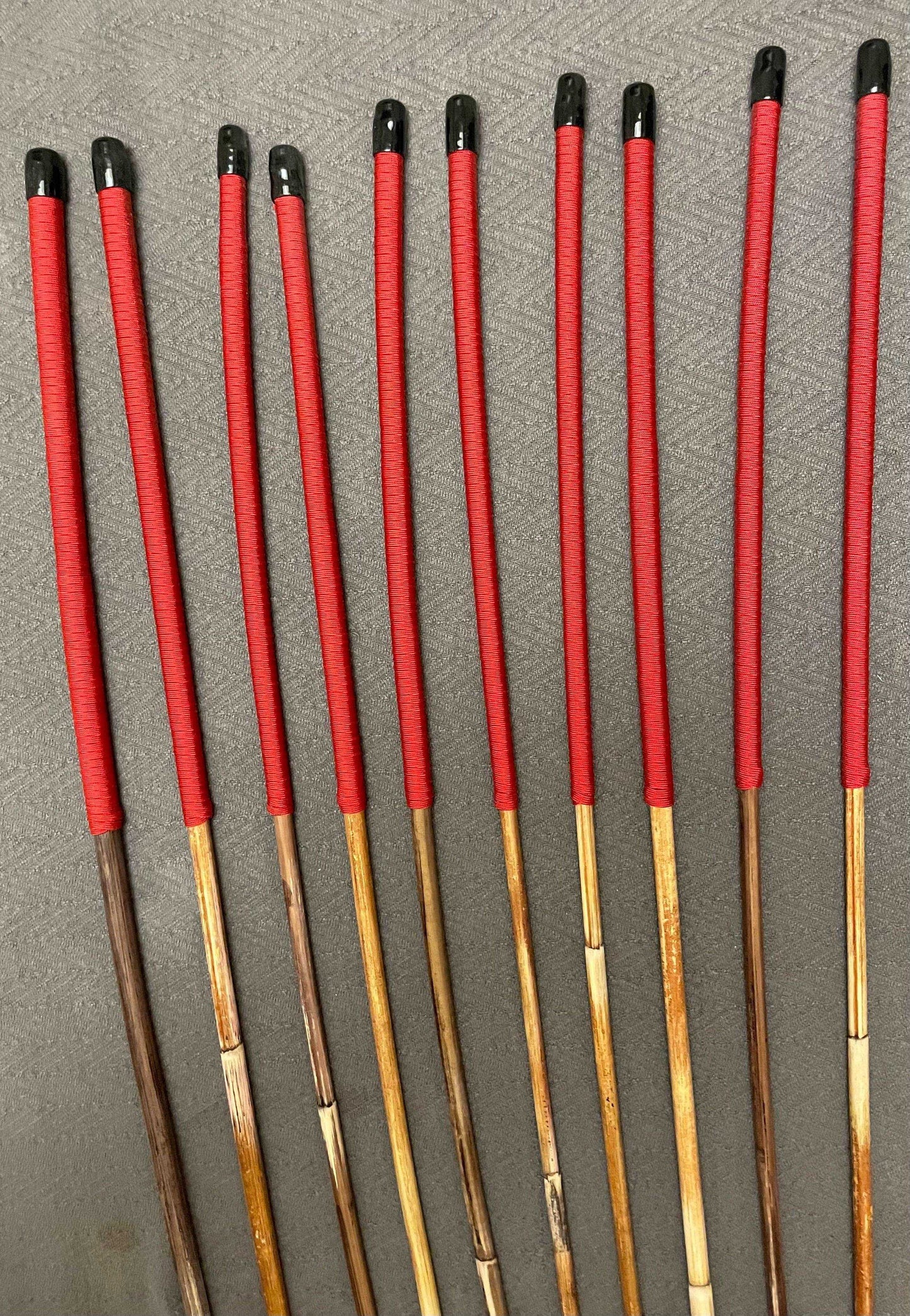 Set of 10 Natural Dragon Rattan Punishment Canes / School Canes / Whipping Canes - SECONDS SET - 95/100 cms Length - RED HANDLES - Stripewell Canes