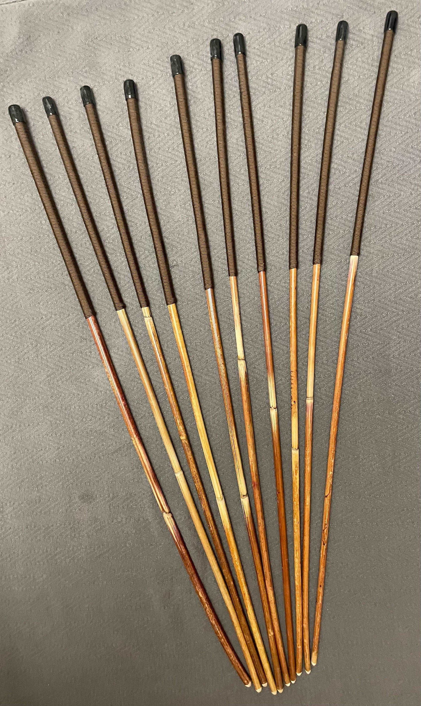 Set of 10 Natural Dragon Rattan Punishment Canes / School Canes / Whipping Canes - SECONDS SET - 95 cms Length - BROWN HANDLES - Stripewell Canes