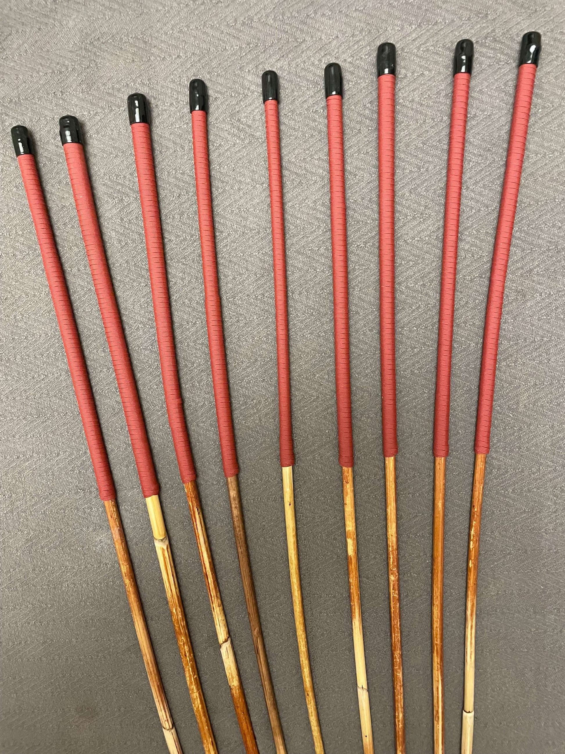 Set of 9 Natural Dragon Canes / BDSM Canes / School Canes SECONDS SET - 95 cms L -& 8 - 13 mm D - Brick Red Paracord Handles - Stripewell Canes