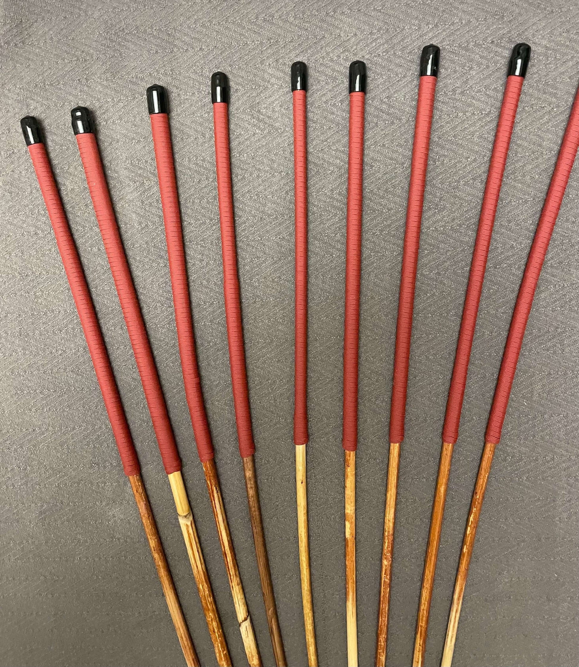 Set of 9 Natural Dragon Canes / BDSM Canes / School Canes SECONDS SET - 95 cms L -& 8 - 13 mm D - Brick Red Paracord Handles - Stripewell Canes