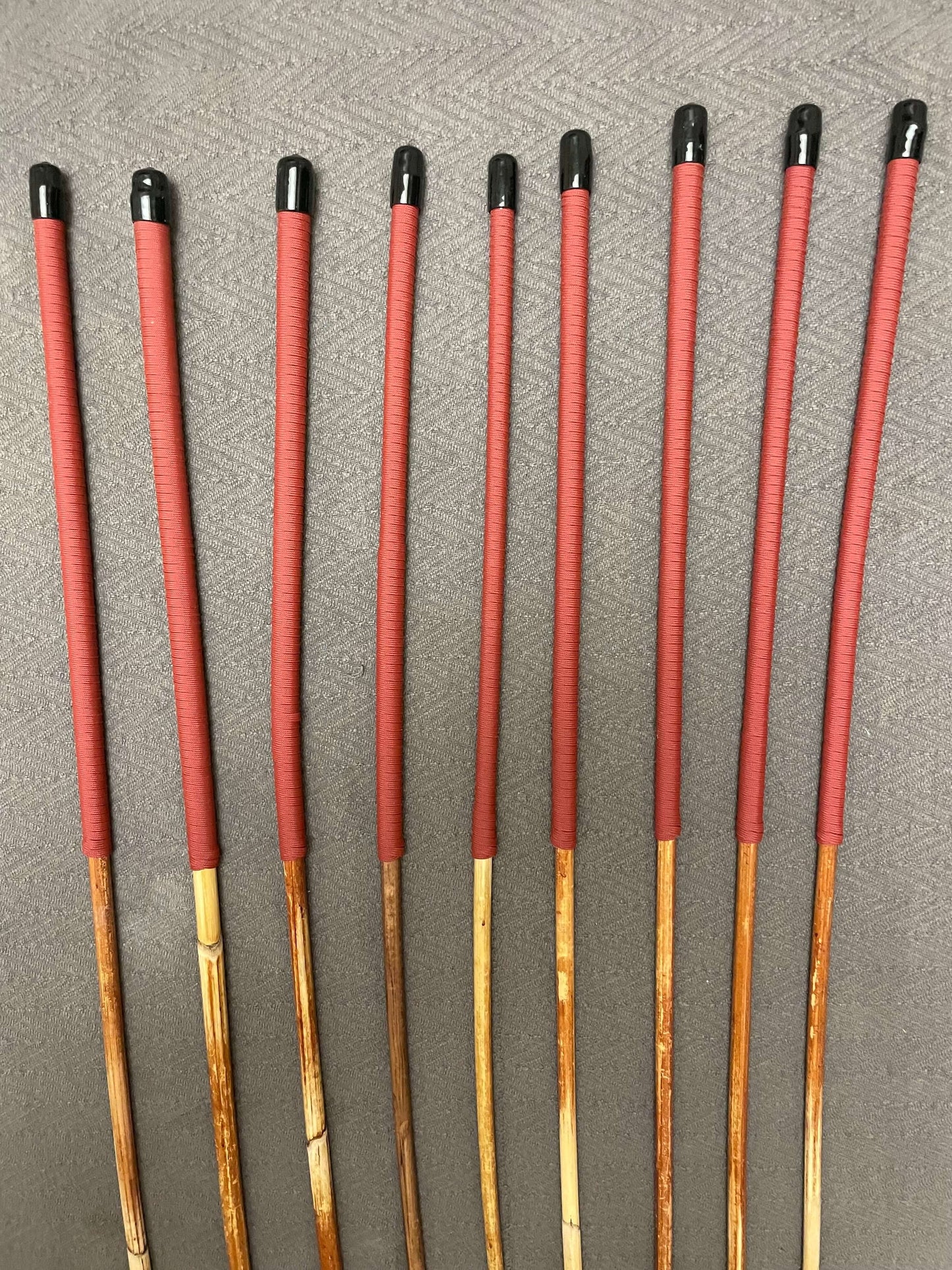 Set of 9 Natural Dragon Canes / BDSM Canes / School Canes SECONDS SET - 95 cms L -& 8 - 13 mm D - Brick Red Paracord Handles - Stripewell Canes