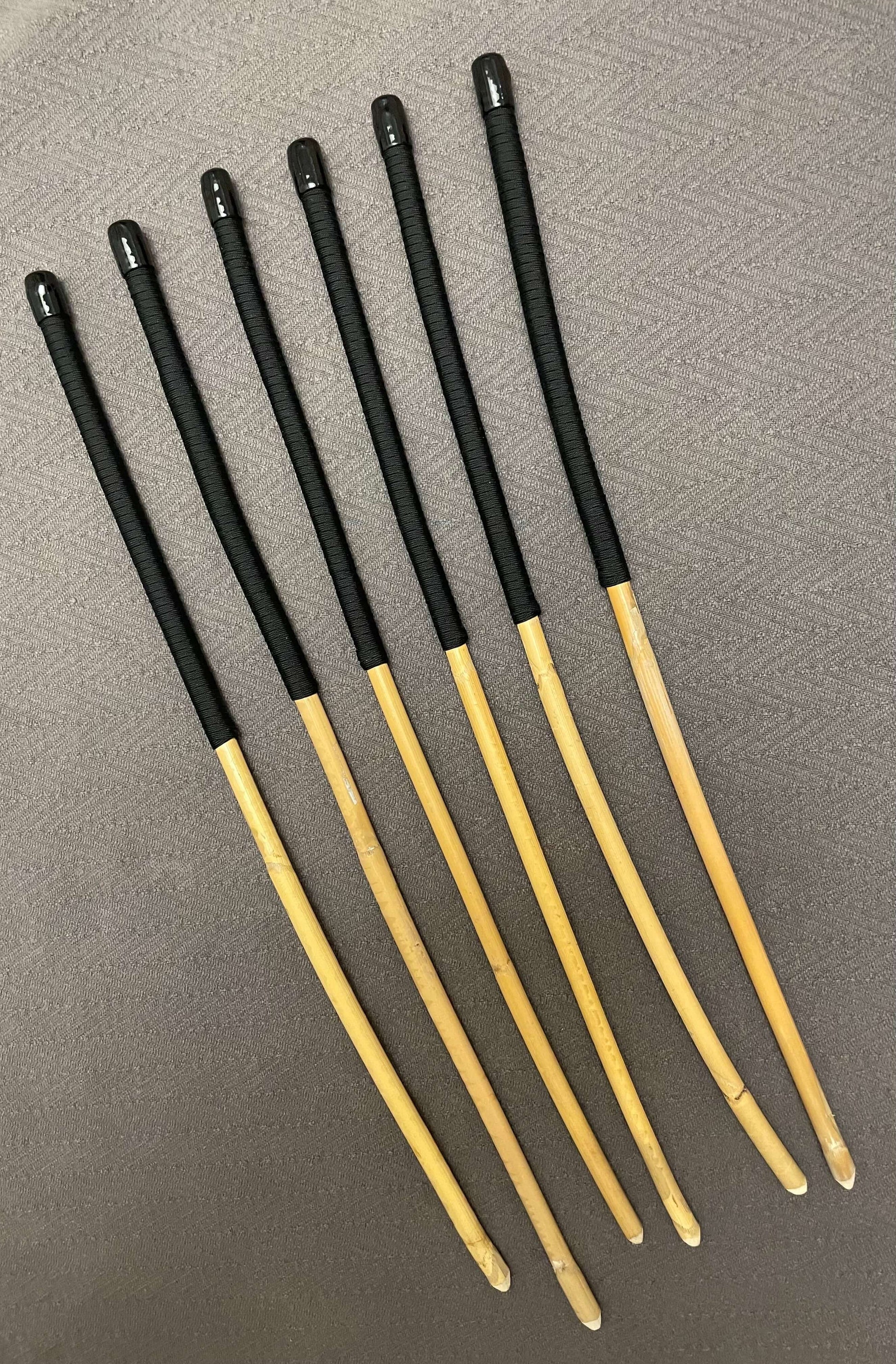 OTK Canes Set of 6 Kooboo Rattan Punishment canes / School Canes - 60 cms Length - BLACK Paracord Handles - Stripewell Canes