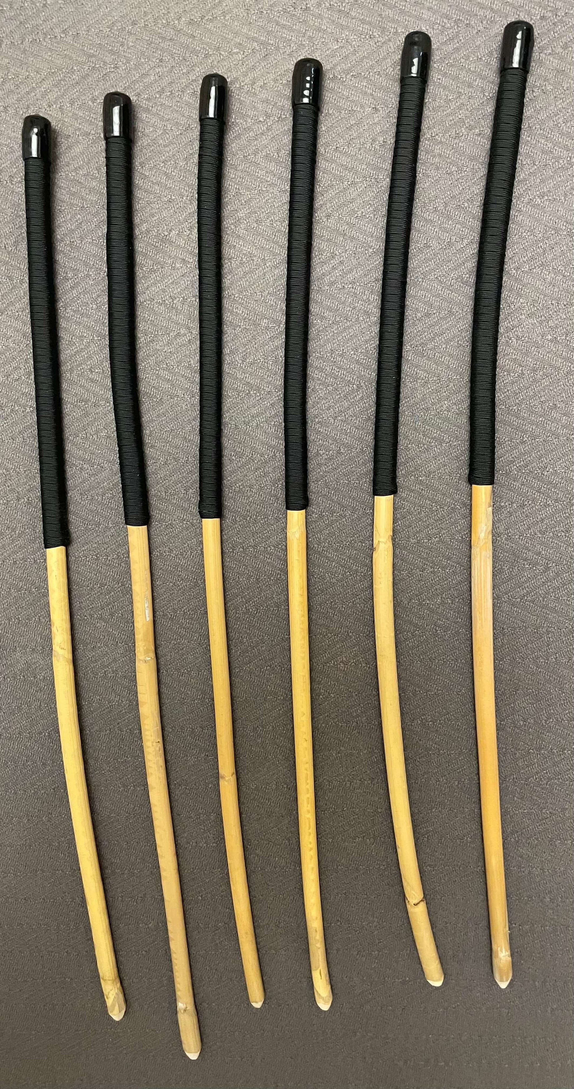 OTK Canes Set of 6 Kooboo Rattan Punishment canes / School Canes - 60 cms Length - BLACK Paracord Handles - Stripewell Canes