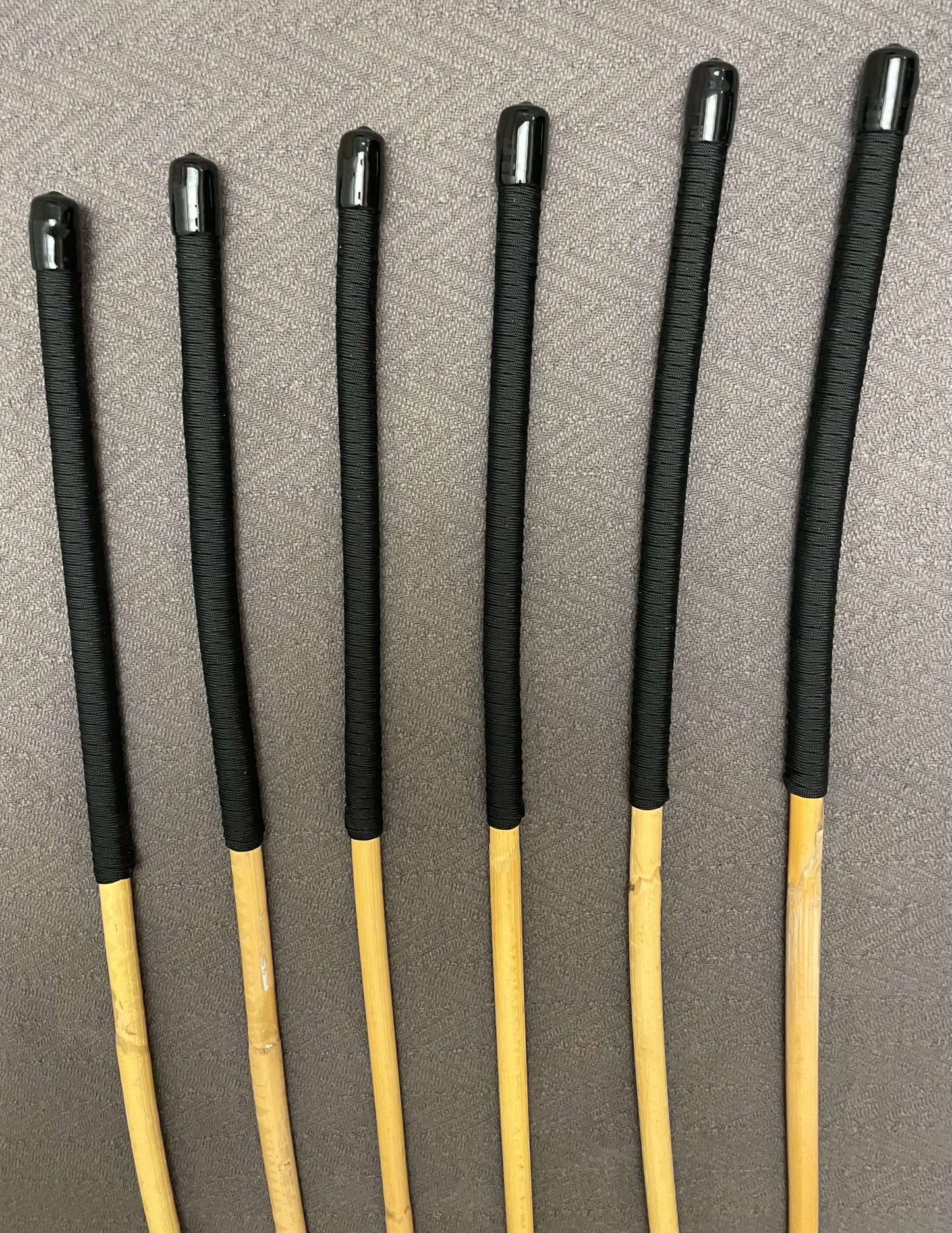 OTK Canes Set of 6 Kooboo Rattan Punishment canes / School Canes - 60 cms Length - BLACK Paracord Handles - Stripewell Canes