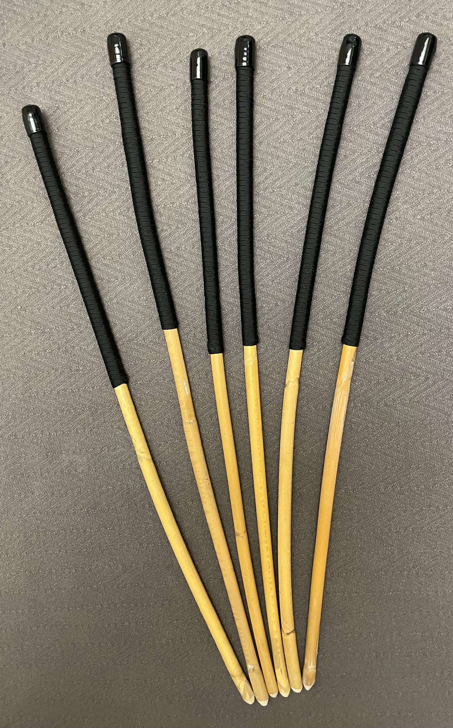 OTK Canes Set of 6 Kooboo Rattan Punishment canes / School Canes - 60 cms Length - BLACK Paracord Handles - Stripewell Canes