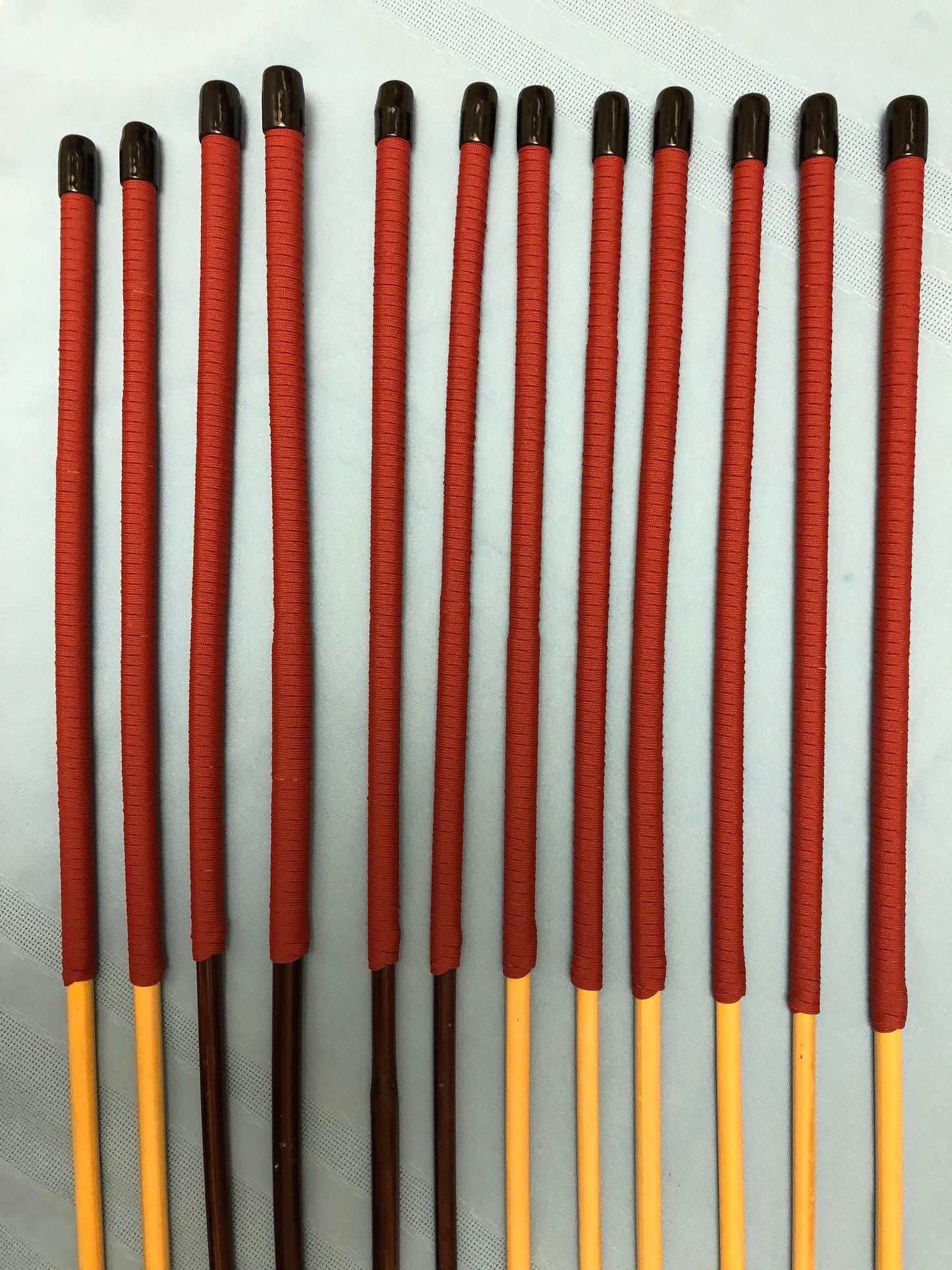 Whippy Mixed Dozen - Set of 12 Whippy/Stingy Natural/Smoked Dragon Rattan / BDSM Canes / School Canes - PRO SELECT SET - 90 cms Length - RED Paracord Handles